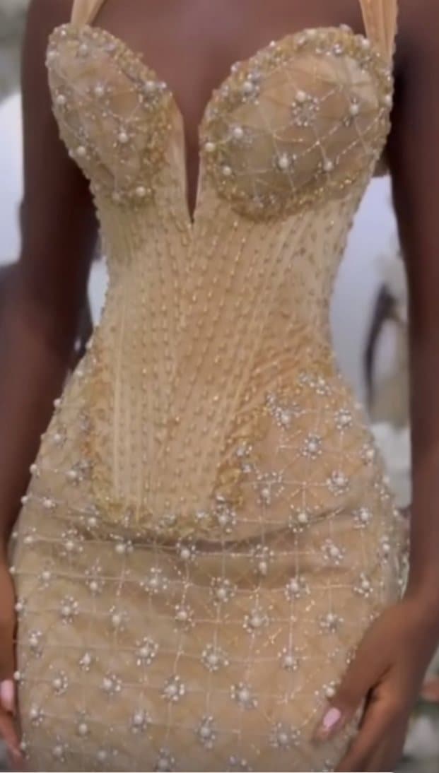 Pearl and crystal beading detail on the champagne gown